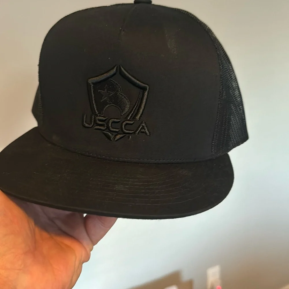 USCCA hat - SnapBack trucker hat. Worn once but is dusty from sitting